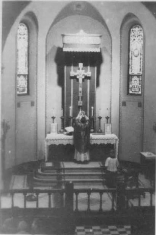 Historic image of priest celebrating mass